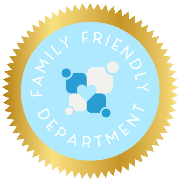 A circular badge with a gold border, featuring the text 